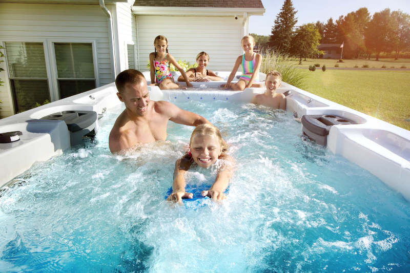 Family enjoying their MasterSpas Swim Spa